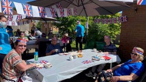 People sitting at a party table